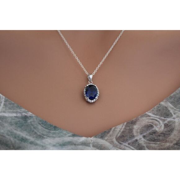 Sterling Silver Blue Oval CZ Pendant Circled in Clear CZ Stones Necklace - Picture 4 of 5